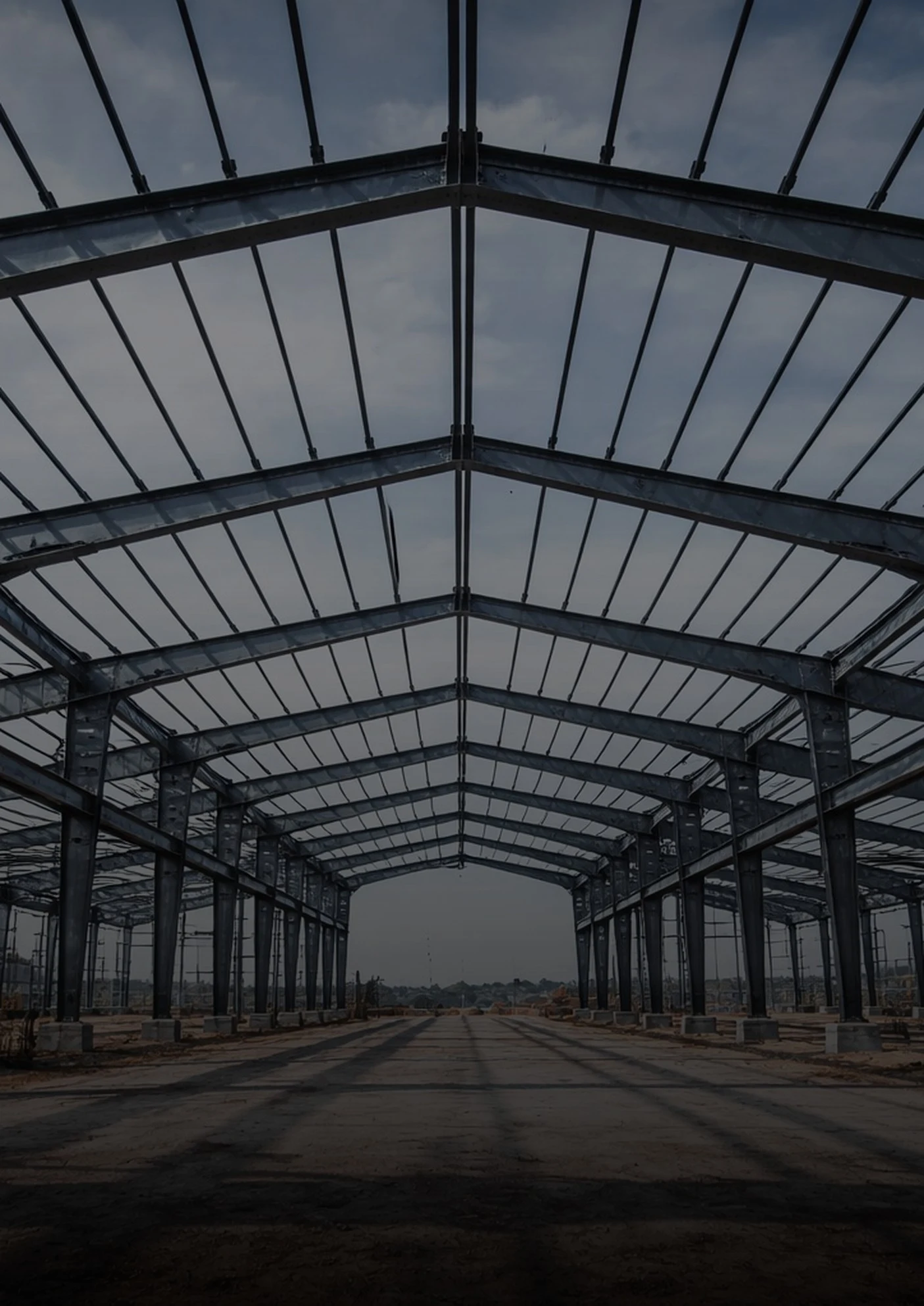 Symmetrical view through an erected structural steel frame