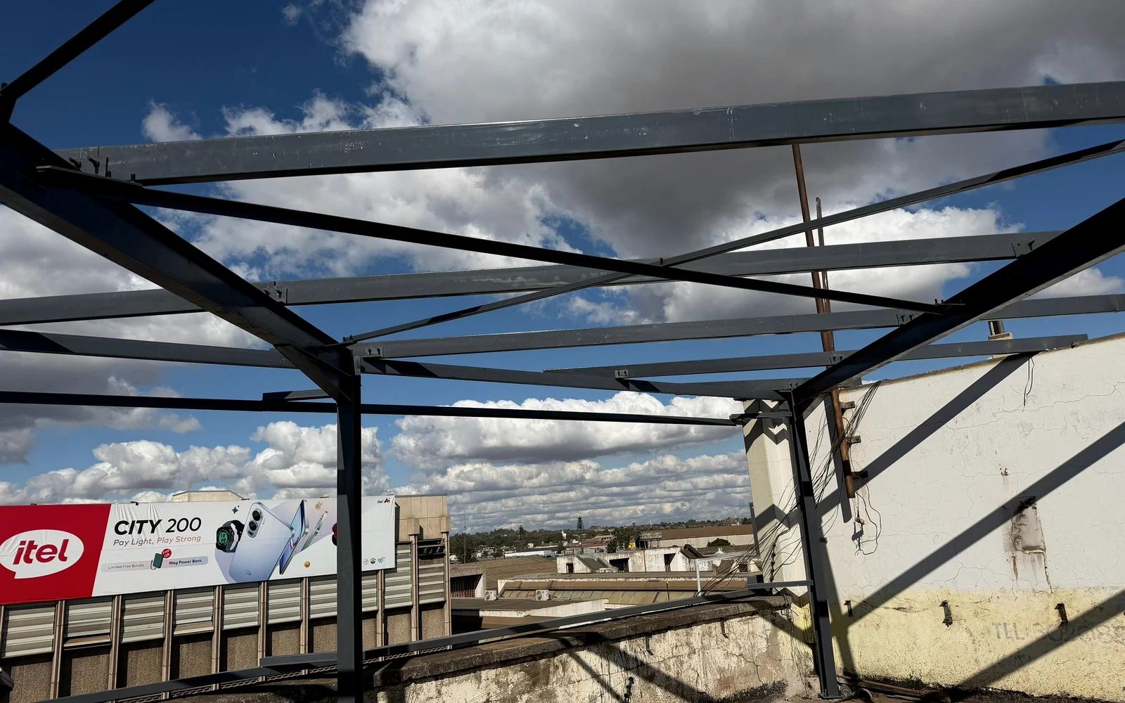 Structural steel roof framing installed above a commercial site